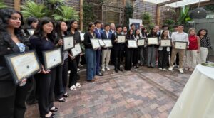 Students lined up to receive intern diploma